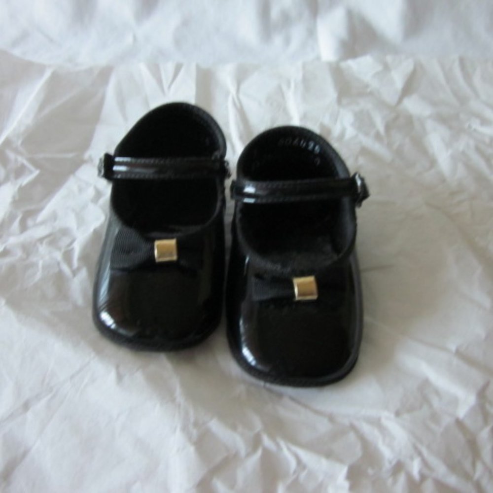 Baby girls' shoes, black patent leather with gold trim on black bows, size 3